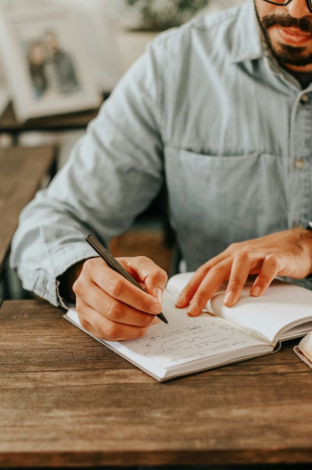 person writing notes