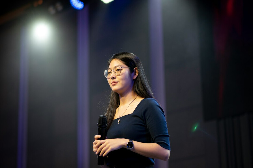 persuasive speaker on stage
