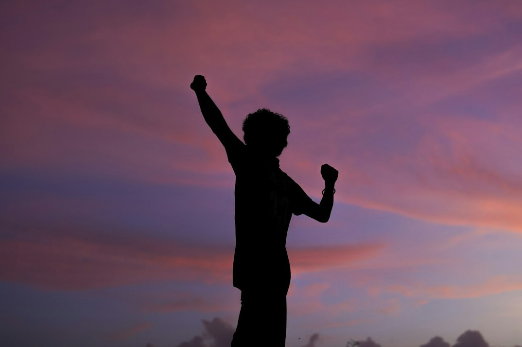 person celebrating small win